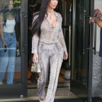 *EXCLUSIVE* Kim Kardashian goes braless in head to toe snakeskin as she is spotted on surprise trip to NYC