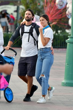 EXCLUSIVE: Brandon Jenner steps out with new girlfriend Carley Stoker after finalizing his divorce. The happy couple, joined by Brandon's mother Linda Thompson, were seen celebrating Brandon's daughter's birthday with a fun day out at Disneyland. The group were seen taking a walk through the theme park as they walked through the new Star Wars Galaxy's Edge, Adventureland and Fantasyland. Brandon's daughter was seen smiling with delight as she enjoyed a lolly pop and Brandon kept his new girlfriend Cayley close as they walked with their arms wrapped around each other. 30 Jul 2019 Pictured: Brandon Jenner, Cayley Stoker, Linda Thompson and Eva James Jenner. Photo credit: Snorlax / MEGA TheMegaAgency.com +1 888 505 6342 (Mega Agency TagID: MEGA476327_012.jpg) [Photo via Mega Agency]