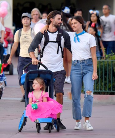 EXCLUSIVE: Brandon Jenner steps out with new girlfriend Carley Stoker after finalizing his divorce. The happy couple, joined by Brandon's mother Linda Thompson, were seen celebrating Brandon's daughter's birthday with a fun day out at Disneyland. The group were seen taking a walk through the theme park as they walked through the new Star Wars Galaxy's Edge, Adventureland and Fantasyland. Brandon's daughter was seen smiling with delight as she enjoyed a lolly pop and Brandon kept his new girlfriend Cayley close as they walked with their arms wrapped around each other. 30 Jul 2019 Pictured: Brandon Jenner, Cayley Stoker, Linda Thompson and Eva James Jenner. Photo credit: Snorlax / MEGA TheMegaAgency.com +1 888 505 6342 (Mega Agency TagID: MEGA476327_002.jpg) [Photo via Mega Agency]