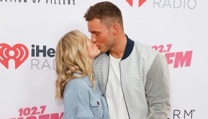 Cassie Randolph & Colton Underwood kissing on the red carpet