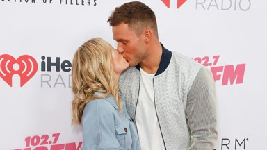 Cassie Randolph & Colton Underwood kissing on the red carpet