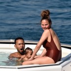 John Legend and Chrissy Teigen enjoy a family boat ride while vacationing in Portofino