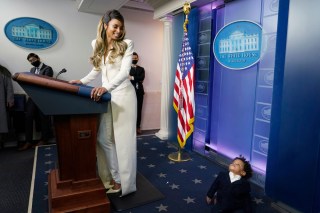Singer Ciara looks down at her son, Win Harrison Wilson, 1, as she poses for photos in the Brady Press Briefing Room of the White House in Washington, . Ciara visited the White House to promote COVID-19 vaccinations for young children
Biden, Washington, United States - 17 Nov 2021