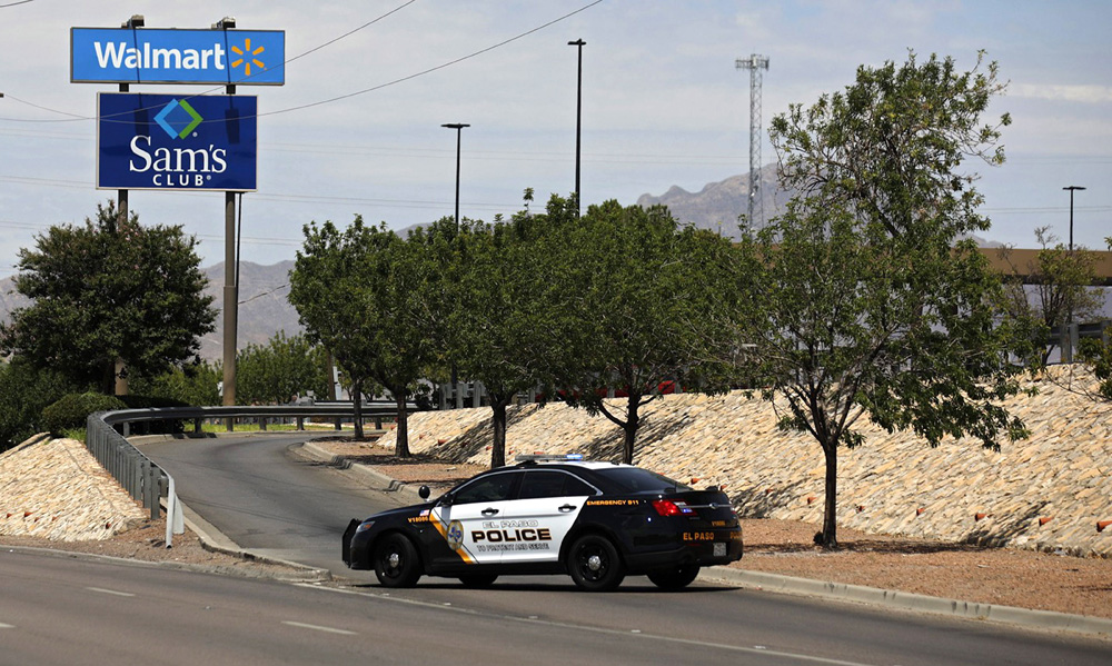 Police stand at attention during an active shooter at a Walmart in El Paso, Texas, USA, 03 August 2019. Multiple shooters and injured are reported.
Active shooter at Walmart in El Paso, Texas, USA - 03 Aug 2019