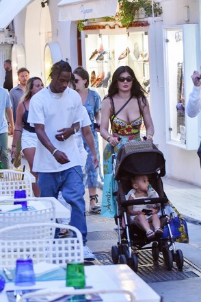 ** RIGHTS: ONLY UNITED STATES, BRAZIL, CANADA ** Capri, ITALY  - *EXCLUSIVE* Kylie Jenner and Travis Scott go shopping with their daughter Stormi and some overzealous bodyguards in Capri.Pictured: Kylie Jenner, Travis Scott, Stormi WebsterBACKGRID USA 8 AUGUST 2019 BYLINE MUST READ: Cobra Team / BACKGRIDUSA: +1 310 798 9111 / usasales@backgrid.comUK: +44 208 344 2007 / uksales@backgrid.com*UK Clients - Pictures Containing ChildrenPlease Pixelate Face Prior To Publication*