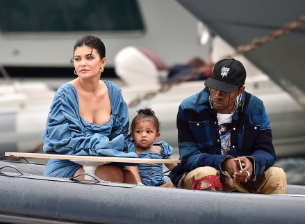 ** RIGHTS: ONLY UNITED STATES, BRAZIL, CANADA ** Portofino, ITALY  - *EXCLUSIVE*  - Kylie Jenner enjoys the day with her adorable daughter Stormy wearing matching denim ruffled dresses by TLZ L'FEMME in Portofino with family. Birthday girl Kylie and Stormy take in the sights with daddy Travis Scott, Scott Disick, Sofia Richie and her mother Kris Jenner and Corey Gamble. The gang arrive at shore via a dinghy ride and strolled through the coastal town of Portofino and turned a few heads with a variety of striking outfits as they go shopping all looking rather glammed up on their Italian break. *Shot on 08/12/19*Pictured: Kylie Jenner - Travis ScottBACKGRID USA 13 AUGUST 2019 BYLINE MUST READ: Cobra Team / BACKGRIDUSA: +1 310 798 9111 / usasales@backgrid.comUK: +44 208 344 2007 / uksales@backgrid.com*UK Clients - Pictures Containing ChildrenPlease Pixelate Face Prior To Publication*