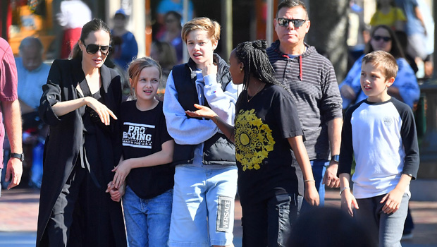 Shiloh Jolie-Pitt At Disneyland In Versace Shorts During Family Outing