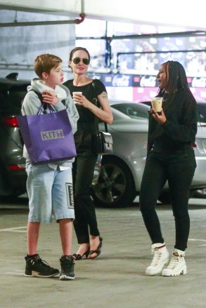 Los Angeles, CA  - *EXCLUSIVE* Angelina Jolie goes shopping with her kids Zahara and Shiloh at Fred Segal in Los Angeles. Angelina checks the price of a fur coat as her kids keep close enjoying their afternoon together.Pictured: Angelina Jolie, Shiloh Nouvel Jolie-Pitt, Zahara Marley Jolie-PittBACKGRID USA 8 AUGUST 2019 USA: +1 310 798 9111 / usasales@backgrid.comUK: +44 208 344 2007 / uksales@backgrid.com*UK Clients - Pictures Containing ChildrenPlease Pixelate Face Prior To Publication*