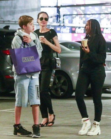 Los Angeles, CA  - *EXCLUSIVE* Angelina Jolie goes shopping with her kids Zahara and Shiloh at Fred Segal in Los Angeles. Angelina checks the price of a fur coat as her kids keep close enjoying their afternoon together.Pictured: Angelina Jolie, Shiloh Nouvel Jolie-Pitt, Zahara Marley Jolie-PittBACKGRID USA 8 AUGUST 2019 USA: +1 310 798 9111 / usasales@backgrid.comUK: +44 208 344 2007 / uksales@backgrid.com*UK Clients - Pictures Containing ChildrenPlease Pixelate Face Prior To Publication*
