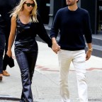 Sofia Richie is all smiles holding hands with Scott Disick while shopping in NYC