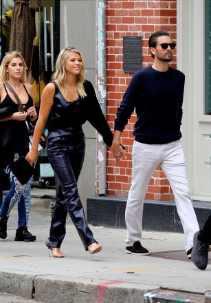 Sofia Richie is all smiles holding hands with Scott Disick while out shopping in Manhattan's Soho area. 08 Sep 2019 Pictured: Sofia Richie and Scott Disick. Photo credit: LRNYC / MEGA TheMegaAgency.com +1 888 505 6342 (Mega Agency TagID: MEGA498782_003.jpg) [Photo via Mega Agency]