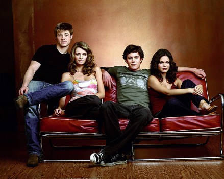 Editorial use only. No book cover usage.Mandatory Credit: Photo by Snap Stills/Shutterstock (2168813a)Benjamin McKenzie as Ryan, Mischa Barton as Marissa, Adam Brody as Seth and Rachel Bilson as Summer; all seated on couch.The O.C - 2004