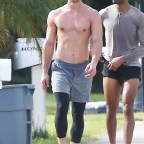 *EXCLUSIVE* Taylor Cameron shows off his fit physique while out on a jog