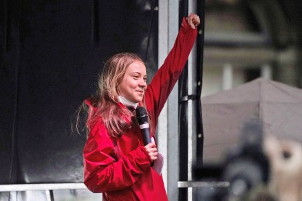 Swedish climate activist Greta Thunberg salutes after giving her speech on the stage of a demonstration in Glasgow, Scotland, which is the host city of the COP26 UN Climate Summit.  The protest was taking place as leaders and activists from around the world were gathering in Scotland's biggest city for the UN climate summit, to lay out their vision for addressing the common challenge of global warming Climate COP26 Summit, Glasgow, United Kingdom - 05 Nov 2021