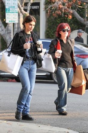 Los Angeles, CA  - *EXCLUSIVE*  - Sharon Osbourne and daughter Aimee pictured matching black jacket and jeans as the duo enjoy some shopping on trendy Melrose Pl.Pictured: Sharon Osbourne, Aimee OsbourneBACKGRID USA 29 DECEMBER 2022 BYLINE MUST READ: GAMR / BACKGRIDUSA: +1 310 798 9111 / usasales@backgrid.comUK: +44 208 344 2007 / uksales@backgrid.com*UK Clients - Pictures Containing ChildrenPlease Pixelate Face Prior To Publication*