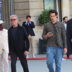 EXCLUSIVE: Actor Pierce Brosnan is seen with his lookalike son Paris as they step out together in Paris, France