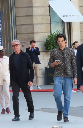 EXCLUSIVE: Actor Pierce Brosnan is seen with his lookalike son Paris as they step out together in Paris, France. Paris, 22, is a talented painter and recently showed off his art work in Los Angeles, CA. 03 Jun 2023 Pictured: Paris & Pierce Brosnan. Photo credit: Love Parigi/ MEGA TheMegaAgency.com +1 888 505 6342 (Mega Agency TagID: MEGA990789_034.jpg) [Photo via Mega Agency]