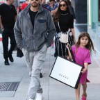 *EXCLUSIVE* Sofia Richie and Scott Disick take Scott's daughter shopping at Gucci