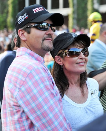 Former Governor of Alaska Sarah Palin and Her Husband Todd (l) Leave the Paddock at the 142nd Belmont Stakes the Final Leg of Racing's Triple Crown at Belmont Park in Elmont New York Usa 05 June 2010 United States Elmont
Usa Horse Racing - Jun 2010