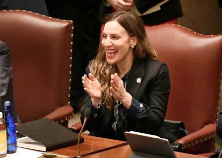 New York Sen. Alessandra Biaggi, D-Bronx, celebrates after her legislation to change state legal standards on sexual harassment to help victims prove harassment cases as members discuss the Bill in the Senate Chamber at the state Capitol, in Albany, N.Y
New York Legislature, Albany, USA - 19 Jun 2019