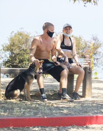 Los Angeles, CALI  - *EXCLUSIVE*  - Miley Cyrus and boyfriend Cody Simpson go hiking with their dog in Los Angeles. The singer wore a mask with BLM on it as her Aussie beau rocked a black mask. The couple then made a quick stop for food before heading home.Pictured: Miley Cyrus, Cody SimpsonBACKGRID USA 4 JUNE 2020 USA: +1 310 798 9111 / usasales@backgrid.comUK: +44 208 344 2007 / uksales@backgrid.com*UK Clients - Pictures Containing ChildrenPlease Pixelate Face Prior To Publication*