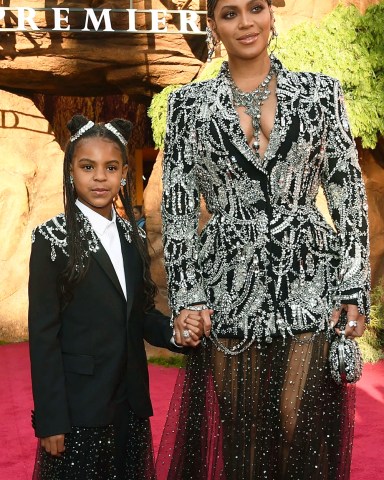 Beyonce, Blue Ivy Carter. Beyonce, right, and her daughter Blue Ivy Carter arrive at the world premiere of "The Lion King", at the Dolby Theatre in Los Angeles
World Premiere of "The Lion King" - Red Carpet, Los Angeles, USA - 09 Jul 2019