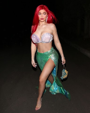 EXCLUSIVE: Kylie Jenner looks Stunning as she dresses as 'Ariel' from 'The Little Mermaid' for a Halloween party in Beverly Hills, CAPictured: Kylie JennerRef: SPL5125471 311019 EXCLUSIVEPicture by: THEREALSPW / SplashNews.comSplash News and PicturesLos Angeles: 310-821-2666New York: 212-619-2666London: +44 (0)20 7644 7656Berlin: +49 175 3764 166photodesk@splashnews.comWorld Rights