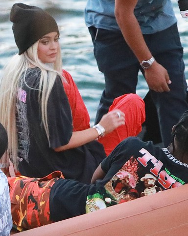 Kylie Jenner and Travis Scott
Kylie Jenner and Travis Scott out and about, Miami, USA - 07 May 2017
Kylie Jenner goes back to being a blonde (like she was with X-Boyfriend Tyga) seen here are the first pictures of a very "BLONDE" Kylie Jenner and her new boyfriend Jacques Webster, Jr. better know as hip-hop singer Travis Scott. The lovebirds arrived by yacht and dined in a private back room of the exclusive restaurant the River Yacht Club where Kylie and Travis looked very happy and were spotted kissing and being very romantic while bodyguards kept out unwanted people.