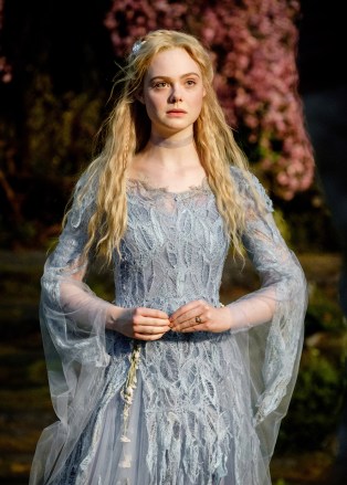 Editorial use only. No book cover usage.Mandatory Credit: Photo by JaapBuitendijk/Roth/Disney/Kobal/Shutterstock (10449365x)Elle Fanning as Aurora'Maleficent: Mistress of Evil' Film - 2019Maleficent and her goddaughter Aurora begin to question the complex family ties that bind them as they are pulled in different directions by impending nuptials, unexpected allies, and dark new forces at play.
