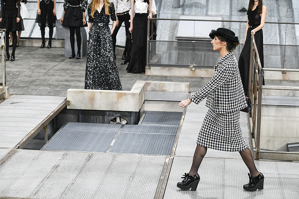 'Prankster' Marie Benoliel, aka Marie S'Infiltre, during the finale
Chanel show, Runway, Spring Summer 2020, Paris Fashion Week, France - 01 Oct 2019
At the end of the Chanel, ready to wear, summer 2020 show, a woman in a Chanel outfit climbed on the catwalk among the other models and did the finale until she was firmly and surprisingly blocked by super model Gigi Hadid, who showed her the exit.