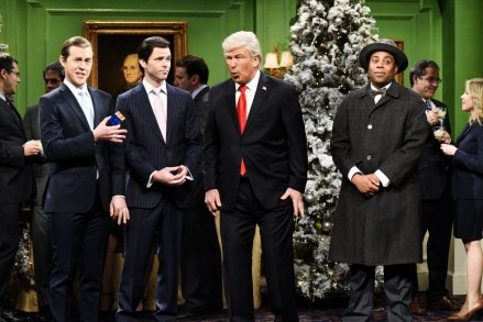 SATURDAY NIGHT LIVE -- "Matt Damon" Episode 1755 -- Pictured: (l-r) Alex Moffat as Eric Trump, Mikey Day as Donald Trump Jr., Alec Baldwin as Donald Trump, and Kenan Thompson as Clarence the angel during the Its a Wonderful Trump Cold Open in Studio 8H on Saturday, December 15, 2018 -- (Photo by: Will Heath/NBC)