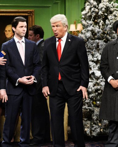 SATURDAY NIGHT LIVE -- "Matt Damon" Episode 1755 -- Pictured: (l-r) Alex Moffat as Eric Trump, Mikey Day as Donald Trump Jr., Alec Baldwin as Donald Trump, and Kenan Thompson as Clarence the angel during the Its a Wonderful Trump Cold Open in Studio 8H on Saturday, December 15, 2018 -- (Photo by: Will Heath/NBC)