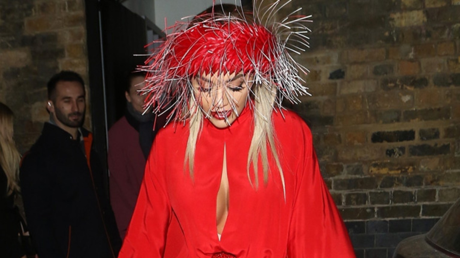 Rita Oras Wardrobe Malfunction Shows Spanx Under High Slit Red Dress Hollywood Life 