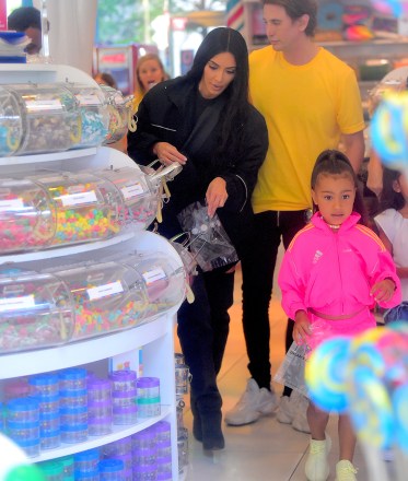 Kim Kardashian was spotted out in NYC on Thursday, as she celebrated her daughter's 5th Birthday. She was joined by BFF Jonathan Cheban as they headed to Dylan's Candy Bar for a Sweet Shopping Spree, as well as a make your own Ice Cream Shop, called Cool Mess. North looked pretty in a pink adidas tracksuit as Kim wore a black jacket and knee high boots. Cheban aka FoodGod showed them some special candies inside the store.

Pictured: 
Ref: SPL5003734 140618 NON-EXCLUSIVE
Picture by: 247PAPS.TV / SplashNews.com

Splash News and Pictures
USA: +1 310-525-5808
London: +44 (0)20 8126 1009
Berlin: +49 175 3764 166
photodesk@splashnews.com

World Rights