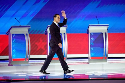 Former Housing and Urban Development Secretary Julian Castro waves as he takes the stage, during a Democratic presidential primary debate hosted by ABC at Texas Southern University in Houston
Election 2020 Debate, Houston, USA - 12 Sep 2019