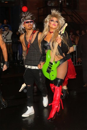 New York, NY  - Mariah Carey bares her toned tummy as she arrives at Heidi Klum’s Halloween Party with her boyfriend Bryan Tanaka.Pictured: Bryan Tanaka, Mariah CareyBACKGRID USA 31 OCTOBER 2019 BYLINE MUST READ: @TheHapaBlonde / BACKGRIDUSA: +1 310 798 9111 / usasales@backgrid.comUK: +44 208 344 2007 / uksales@backgrid.com*UK Clients - Pictures Containing ChildrenPlease Pixelate Face Prior To Publication*