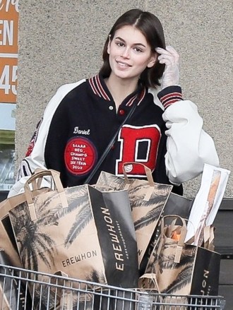 West Hollywood, CA  - *EXCLUSIVE*  - Kaia Gerber, Ashley Benson and Cara Delevingne grocery shop in West Hollywood. In seeming defiance of recommendations to keep distance from people in light of the current Covid-19 scare, the trio engaged in a group hug while inside the store but did wear protective gloves while out before walking out to load up their purchases. Despite the worldwide panic over the virus, the group appeared in great spirits as they shopped together.Pictured: Kaia GerberBACKGRID USA 15 MARCH 2020 USA: +1 310 798 9111 / usasales@backgrid.comUK: +44 208 344 2007 / uksales@backgrid.com*UK Clients - Pictures Containing ChildrenPlease Pixelate Face Prior To Publication*