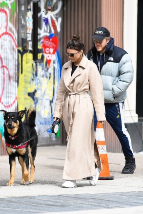 Emily Ratajkowski and husband Sebastian Bear-McClard walk their dog Colombo in New York City.Emily was makeup free and looked downcast on the eve of Governor Cuomo shutting down New York City due to Coronavirus.Pictured: Emily Ratajkowski,Sebastian Bear-McClard,ColomboRef: SPL5158289 220320 NON-EXCLUSIVEPicture by: Robert O'Neil / SplashNews.comSplash News and PicturesLos Angeles: 310-821-2666New York: 212-619-2666London: +44 (0)20 7644 7656Berlin: +49 175 3764 166photodesk@splashnews.comWorld Rights