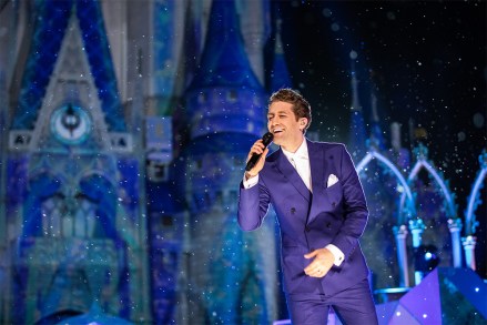 THE WONDERFUL WORLD OF DISNEY: MAGICAL HOLIDAY CELEBRATION - The Tony, Emmy and two-time Golden Globe-nominated artist Matthew Morrison performs a medley of “When You Wish Upon A Star” and “Let it Snow” at Magic Kingdom Park in Lake Buena Vista, Fla., during “The Wonderful World of Disney: Magical Holiday Celebration.” The two-hour holiday special airs Thursday, Nov. 28, 2019 at 8 p.m. EST on ABC and on the ABC app. (Steven Diaz/Walt Disney World Resort)MATTHEW MORRISON