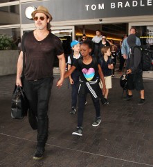 Brad Pitt, Angelina Jolie, Shiloh Jolie-Pitt, Maddox Jolie-Pitt, Pax Jolie-Pitt, Knox Leon Jolie-Pitt, Zahara Jolie-Pitt, Vivienne Jolie-Pitt
Brad Pitt and Angelina Jolie at LAX Airport, Los Angeles, America - 05 Jul 2015
Brad Pitt and Family arriving at the Los Angeles International Airport