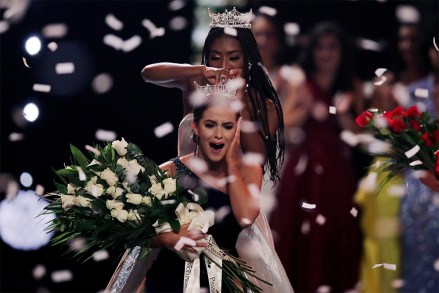 Camille Schrier, of Virginia, reacts reacts as she is crowned after winning the Miss America competition at the Mohegan Sun casino in Uncasville, Conn.,. At rear is 2019 Miss. America Nia Franklin
Miss America, Uncasville, USA - 19 Dec 2019