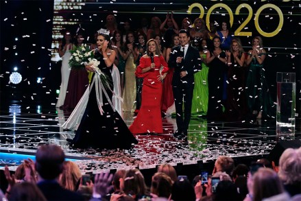 Camille Schrier, of Virginia, left, reacts after winning the Miss America competition at the Mohegan Sun casino in Uncasville, Conn
Miss America, Uncasville, USA - 19 Dec 2019