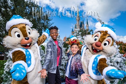 Disney Channel’s “BUNK'D” stars Scarlett Estevez and Israel Johnson pose with Chip ‘n Dale at Magic Kingdom Park in Lake Buena Vista, Fla., while taping the “Disney Channel Holiday Party @ Walt Disney World,” airing Friday, Dec. 13, from 8:00-8:30 p.m. EST/PST, on Disney Channel and in the DisneyNOW app. (Matt Stroshane/Walt Disney World Resort)