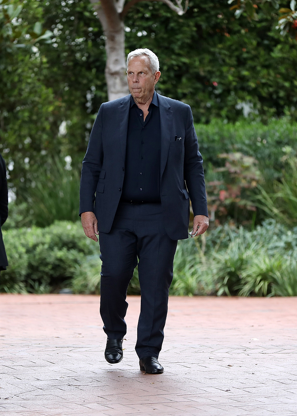 Steve Tisch leaving Harry Morton's memorial service