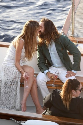 ** RIGHTS: ONLY UNITED STATES, BRAZIL, CANADA ** Capri, ITALY  - Heidi Klum, dazzles in bridal-inspired lace dress as she kisses husband Tom Kaulitz, on boat in Capri ahead of their second wedding ceremony

Pictured: Heidi Klum, Tom Kaulitz

BACKGRID USA 3 AUGUST 2019 

USA: +1 310 798 9111 / usasales@backgrid.com

UK: +44 208 344 2007 / uksales@backgrid.com

*UK Clients - Pictures Containing Children
Please Pixelate Face Prior To Publication*