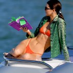 Kendall Jenner Wears An Orange Bikini During A Boat Ride In Miami Beach, Florida