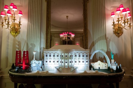 The White House made of gingerbread also features landmarks from around the country in the State Dinning Room during the 2019 Christmas preview at the White House, in Washington
White House Christmas, Washington, USA - 02 Dec 2019