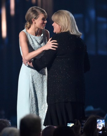 Andrea Finlay, right, presents the milestone award to her daughter Taylor Swift at the 50th annual Academy of Country Music Awards at AT&T Stadium, in Arlington, Texas
50th Annual Academy Of Country Music Awards - Show, Arlington, USA - 19 Apr 2015