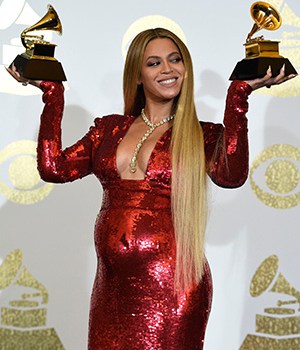 Beyonce poses in the press room with the awards for best music video for "Formation" and best urban contemporary album for "Lemonade" at the 59th annual Grammy Awards at the Staples Center, in Los AngelesThe 59th Annual Grammy Awards - Press Room, Los Angeles, USA - 12 Feb 2017