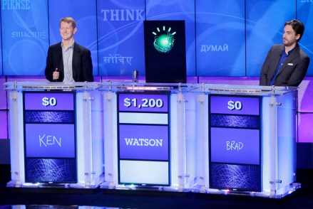 Ken Jennings, Brad Rutter Jeopardy!" champions Ken Jennings, left, and Brad Rutter, right, look on as an IBM computer called "Watson" beats them to the buzzer to answer a question during a practice round of the "Jeopardy!" quiz show in Yorktown Heights, N.Y., . It's the size of 10 refrigerators, and it swallows encyclopedias whole, but an IBM computer was lacking one thing it needed to battle the greatest champions from the "Jeopardy!" quiz TV show - it couldn't hit a buzzer. But that's been fixed, and on Thursday the hardware and software system named Watson played a competitive practice round against two champions. A "Jeopardy!" show featuring the computer will air in mid-February, 2011
Man vs Machine, Yorktown Heights, USA